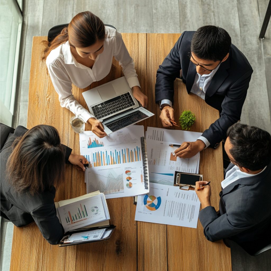team conducting financial review meeting 1536x1536 1